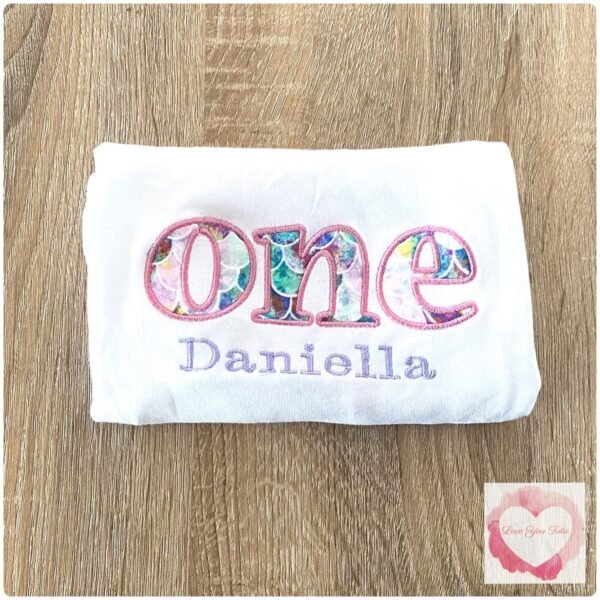 Embroidered mermaid scales one design