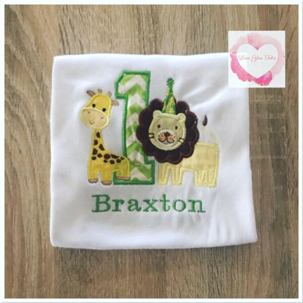 Embroidered lion/ giraffe design