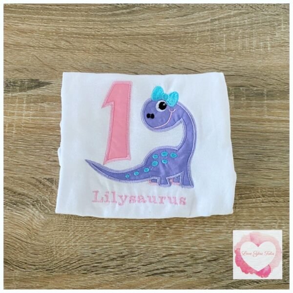 Embroidered pastel dinosaur design