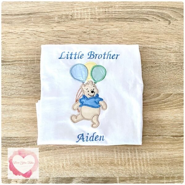 Embroidered yellow bear design
