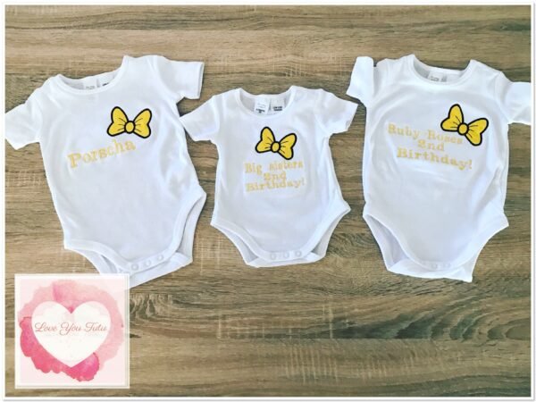 Embroidered yellow bow design